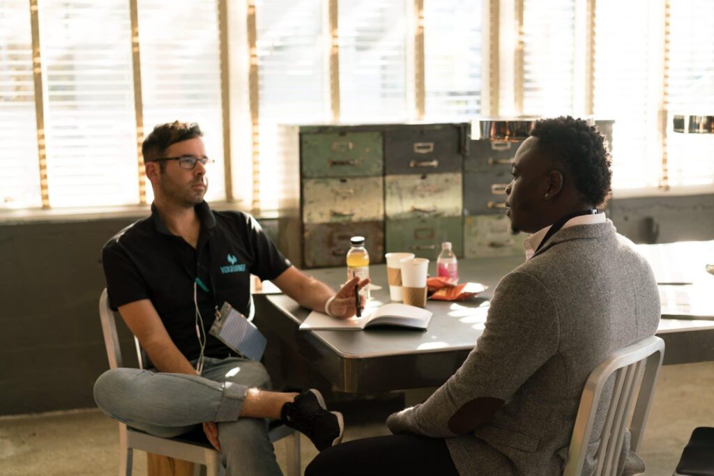 Marketing professional listening carefully to a customer during a one-on-one business conversation